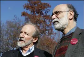  ?? ALEX BRANDON — THE ASSOCIATED PRESS ?? Michael, left, and Robert Meeropol, the sons of Ethel Rosenberg, speak to reporters after they attempted to deliver a letter to President Barack Obama in an effort to obtain a pardon for their mother Ethel Rosenberg, in front of the White House...