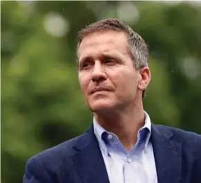  ?? (AP Photo/Jeff Roberson, File) ?? In this May 17, 2018 file photo, Missouri Gov. Eric Greitens looks on before speaking at an event near the capitol in Jefferson City, Mo. Greitens, a sometimes brash outsider whose unconventi­onal resume as a Rhodes Scholar and Navy SEAL officer made...