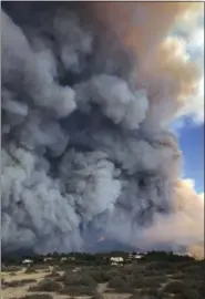  ?? COURTEST OF BEN WATKINS VIA THE ASSOCIATED PRESS ?? Smoke from the wildires fills the air in Malibu, Calif., on Friday.