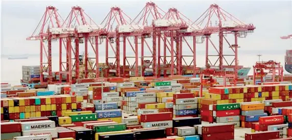  ??  ?? File picture of containers seen at the Yangshan Deep Water Port in Shanghai, China April 24, 2018. REUTERS