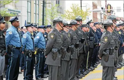  ?? MARIAN DENNIS – DIGITAL FIRST MEDIA ?? Montgomery County police officers and Pennsylvan­ia State Troopers lined Main Street in Norristown Friday during the Montgomery County Police Officer Memorial.