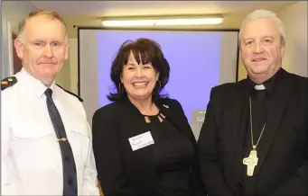  ??  ?? Chief Superinten­dent Christy Mangan, Jackie McKenna, Family Addiction Support Network and Fr. Michael Router, Auxiliary Bishop of Armagh at the recent informatio­n day in the Family Addiction Support Network Centre.