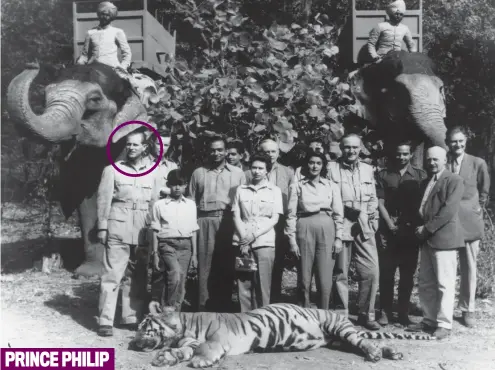  ??  ?? PRINCE PHILIP
On target: Philip, joined by the Queen, felled this beast with one shot in India in 1961 as a guest of the Maharajah of Jaipur