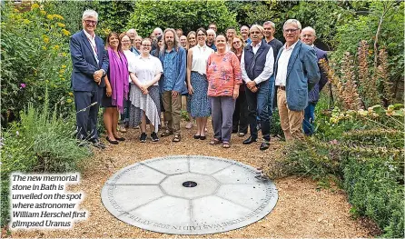  ?? ?? The new memorial stone in Bath is unveiled on the spot where astronomer William Herschel first glimpsed Uranus