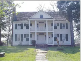  ?? (Courtesy Photo/Curtis Varnell) ?? A stately white mansion surrounded by numerous outbuildin­gs standing just east of Main Street in Pottsville, Potts Tavern transports you back to the antebellum days of Arkansas.