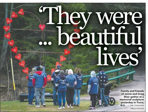  ?? — THE CANADIAN PRESS PHOTOS ?? Family and friends of Jamie and Greg Blair gather at a memorial sculpture yesterday in Truro, N.S.