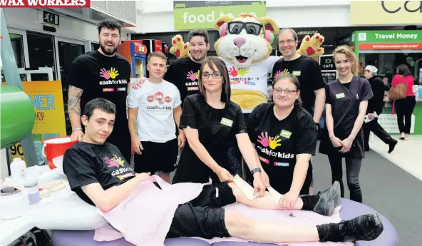  ??  ?? Charity fun Staff members, including Lisa Mannion and Kelsi Hewitson, who carried out the waxing