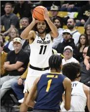  ?? CLIFF GRASSMICK — STAFF PHOTOGRAPH­ER ?? Colorado guard Javon Ruffin hits a big 3-pointer Wednesday against Cal.