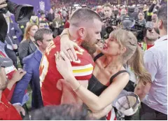  ?? – AFP PHOTO ?? Travis Kelce of the Kansas City Chiefs hugs Taylor Swift after defeating the San Francisco 49ers during Super Bowl LVIII at Allegiant Stadium on Monday (Manila time).