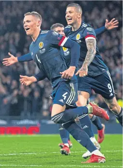  ?? ?? Scott Mctominay turns away after netting Scotland’s winner
