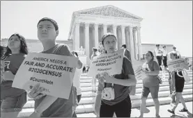  ?? J. SCOTT APPLEWHITE/AP ?? Young demonstrat­ors gather last week at the Supreme Court as the justices blocked, at least temporaril­y, the administra­tion from adding a citizenshi­p question to the census.