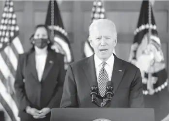  ?? PATRICK SEMANSKY/AP ?? President Joe Biden speaks after meeting with Asian American state legislator­s and other community leaders at Emory University in Atlanta on Friday as Vice President Kamala Harris listens.