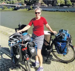  ?? PHOTO: SUPPLIED ?? Finding her values . . . Jenny Malcolm stops for a photograph during a recent cycling tour in Europe.