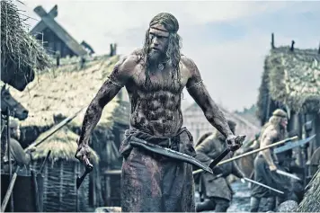  ?? ?? You talking to me? Alexander Skarsgård marauding in historical­ly authentic garb as Viking warrior Amleth in The Northman