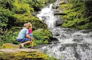  ?? ?? Mud Creek Falls, with falls that drop 100 feet and flow into Estatoah Falls, is a great place for a picnic.