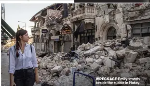  ?? ?? WRECKAGE Emily stands beside the rubble in Hatay