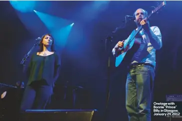  ??  ?? Onstage with Bonnie “Prince” Billy, in Glasgow, January 29, 2012