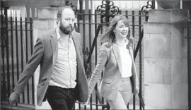  ?? Frank Augstein Associated Press ?? CHIEFS OF STAFF Nick Timothy and Fiona Hill, pictured Friday in London, are the first high-profile members of the prime minister’s core team to step down.