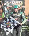  ?? COLIN E. BRALEY/AP ?? Driver Chase Elliott celebrates winning Sunday’s NASCAR Cup race at Kansas Speedway.