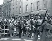  ?? Picture: Harry Shepherd/Fox Photos/Getty ?? Crowds welcome British troops on Jersey in May 1945 during the liberation of the Channel Islands.