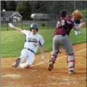  ?? AUSTIN HERTZOG — DFM FILE ?? Pope John Paul II’s Mike Kelly scored the game-winning run in Saturday’s 10-inning win over Upper Perk.