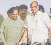  ?? SHASHI S KASHYAP/ HT PHOTO/PTI ?? Shiv Sena chief Uddhav Thackeray (left) with party MLA and son Aaditya Thackeray; Congress leader Ahmed Patel with NCP chief Sharad Pawar, in Mumbai on Tuesday.