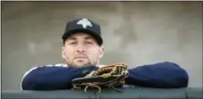  ?? SEAN RAYFORD — THE ASSOCIATED PRESS FILE ?? Tim Tebow looks out from the dugout before Columbia’s game against the Augusta GreenJacke­ts in Columbia, S.C. Tebow has been promoted to the New York Mets’ high Class A affiliate in St. Lucie, Fla.