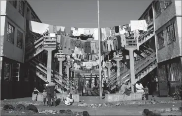  ?? PHOTO: HENK KRUGER/CAPE ARGUS ?? Clothes hung out to dry in Manenberg Avenue, Manenberg, Cape Town. The writer believes that the vast difference in fortune between rich and poor has its roots in the ownership of land and the resultant economic power that goes with that.