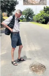 ?? ?? Roger Lavoipierr­e hangs his head in shame at the numerous potholes on Davies Crescent