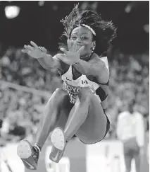  ?? ANDY WONG/THE ASSOCIATED PRESS ?? Canada’s Christabel Nettey fell just short of the podium in the women’s long jump at the world championsh­ips at the Bird’s Nest stadium in Beijing Friday. Her best was 6.95 metres.