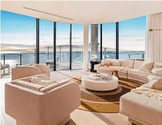  ?? ?? Tom and Emma Lane have offloaded their luxury Gold Coast apartment for $9.2m.