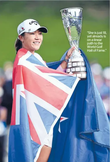  ?? Photo: GETTY IMAGES ?? Lydia Ko of New Zealand holds the trophy after winning the Evian Championsh­ip this morning in Evian-les-Bains, France.