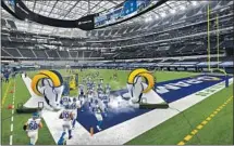  ?? Wally Skalij Los Angeles Times ?? Photog raphs by
THE RAMS christened new but empty SoFi Stadium on Sept. 13 with a season-opening, 20-17 victory over the Dallas Cowboys.