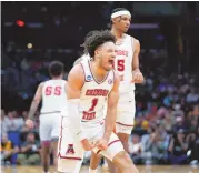  ?? ASSOCIATED PRESS ?? Alabama guard Mark Sears (1) celebrates after scoring during Saturday’s NCAA Tournament Elite 8 game against Clemson in Los Angeles.