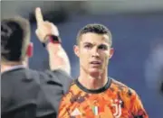  ?? AP ?? Juventus' Cristiano Ronaldo watches referee Carlos del Cerro Grande gesturing during the Champions League round of 16 match against FC Porto on Thursday