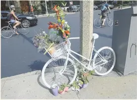  ?? STAFF PHOTO BY TED FITZGERALD ?? CHANGES: The intersecti­on at Massachuse­tts Avenue and Beacon Street where a bicyclist was struck and killed earlier this month is being redesigned.