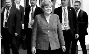  ?? PHOTO: REUTERS ?? German Chancellor Angela Merkel leaves a European Union leaders summit in Brussels on Friday