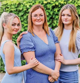  ?? ?? Heartbreak: Nurse Helen Bone, with her daughters, was diagnosed a year ago