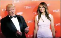  ??  ?? Trump and his wife Melania on the red carpet as they arrive for the TIME 100 Gala in Manhattan, New York, yesterday.