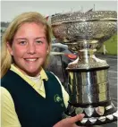  ??  ?? Sara Byrne shows off the Irish Women’s Close Championsh­ip trophy