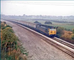  ??  ?? The railway between Wigan and Manchester via Atherton only saw loco-hauled services that were diverted from their usual routes. This London-bound train has just passed Atherton with 411 in charge. (Ian Isherwood)