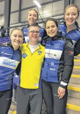  ?? RICHARD MACKENZIE • TRURO NEWS ?? Jonathan Henry is pictured with Team Anna Hasselborg from Sweden, during a Pinty’s World Curling event in Pictou County in 2019.