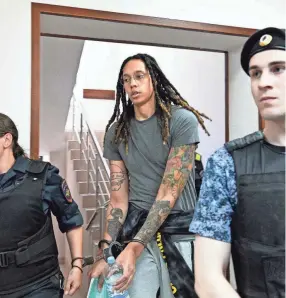  ?? KIRILL KUDRYAVTSE­V/AFP VIA GETTY IMAGES ?? Brittney Griner arrives to a hearing at the Khimki Court, outside Moscow, on June 27.