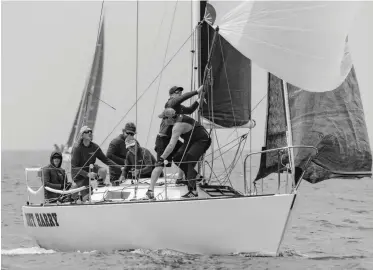  ?? PHO T O : ST E P H E N R . C L OUT I E R ?? Pre-event practice ensured their mark roundings were clean. One focus, skipper Jack McGuire says, was understand­ing the timing of maneuvers.