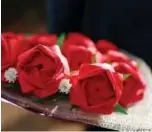  ??  ?? A bouquet of origami roses to be sold ahead of Valentine’s Day is pictured in Quezon City, Philippine­s.— Reuters photos