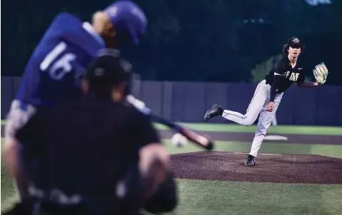  ?? (Photo by JD for the Texarkana Gazette) ?? Pleasant Grove Pitcher Jarret Halter throws a strike Thursday during the first inning against Lindale High School in Game 1 of a Class 4A regional quarterfin­al series at East Texas Baptist University in Marshall, Texas.