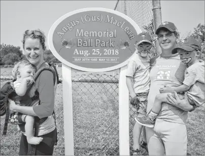  ?? JEREMY FRASER/CAPE BRETON POST ?? The family of the late Angus (Gus) MacLean was on hand for the renaming of the East Bay baseball field, located behind the local fire department, on Saturday. The field was named in memory of MacLean, a former volunteer firefighte­r and fastpitch player, who died on May 13, 2017, age the age of 66, after a battle with cancer. From left are Ariane MacLean, Ted MacLean, Alex MacLean, Scott MacLean and Andrew MacLean.