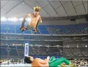  ?? New Japan Pro Wrestling ?? “EL PHANTASMO,” above, and Ryusuke Taguchi compete in the New Japan Pro Wrestling event.