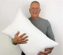  ?? ?? Alexander Miles, inventor of the Gx Pillow pictured with his invention