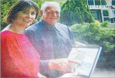  ??  ?? PLANS: Lorraine Moller and South Waikato Mayor Gordon Blake look over the plans for the Putaruru water feature.